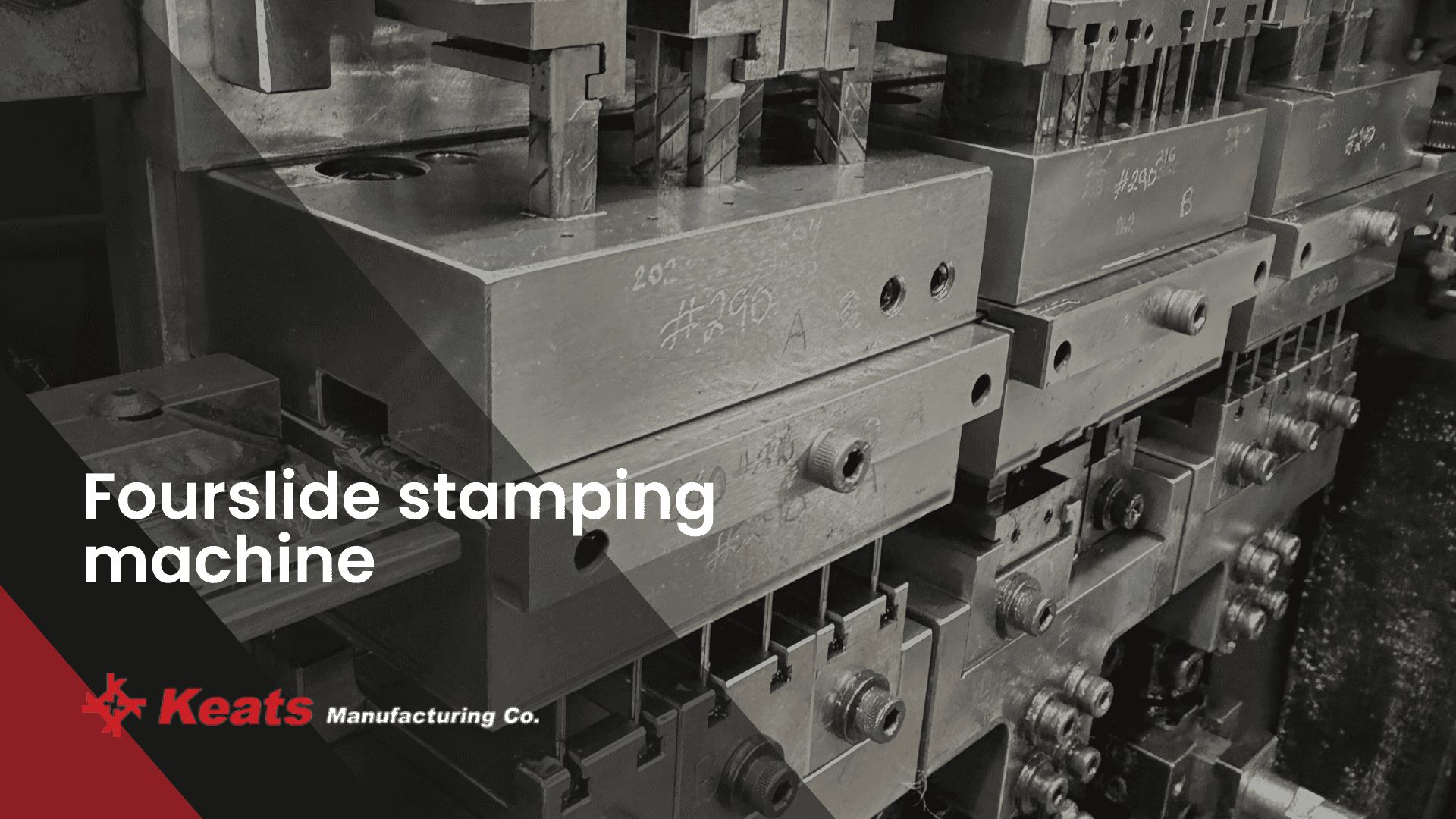 Fourslide stamping machine at Keats Manufacturing Co. for precision metal forming.