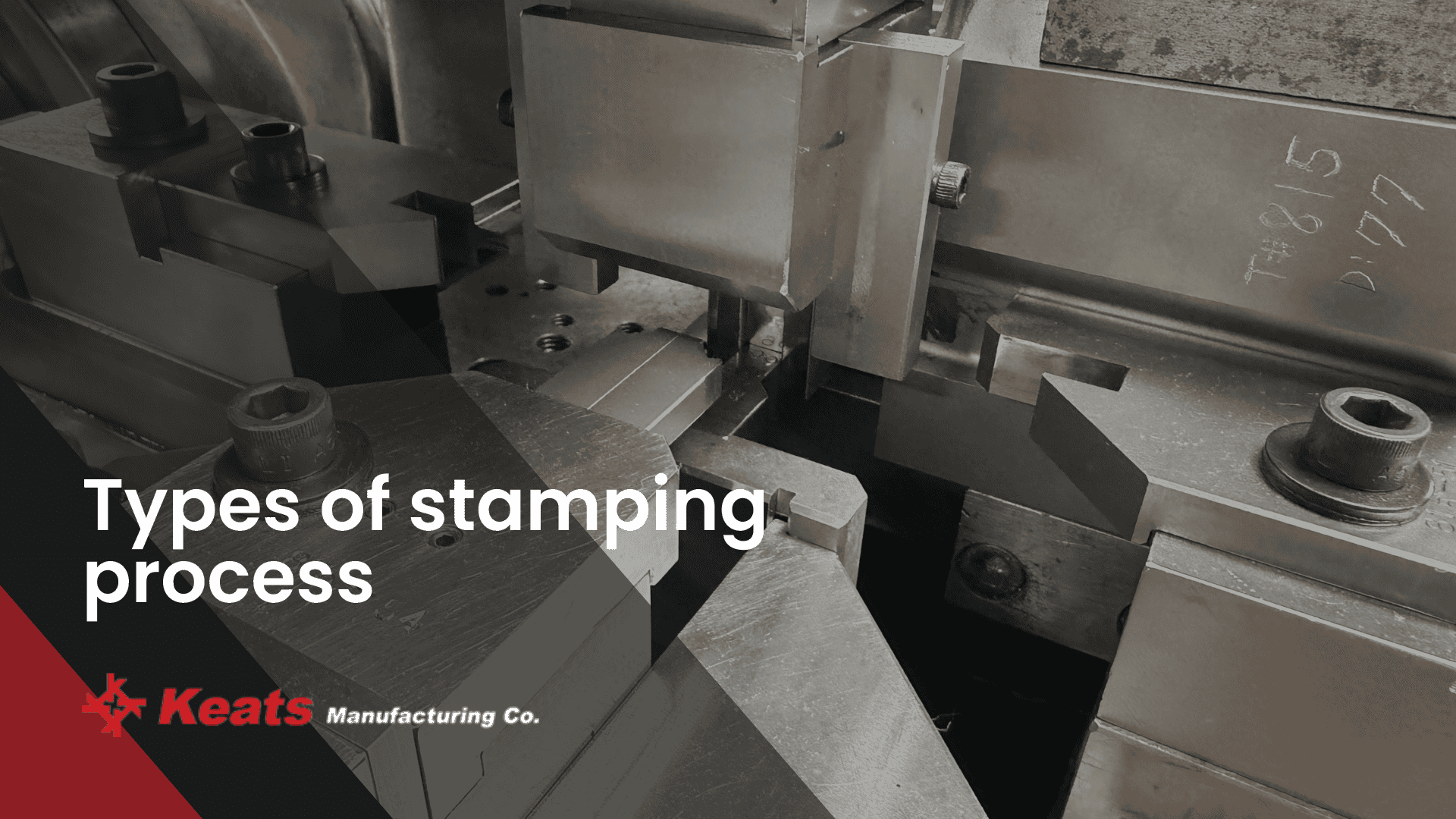 Close-up of industrial stamping process machinery at Keats Manufacturing.