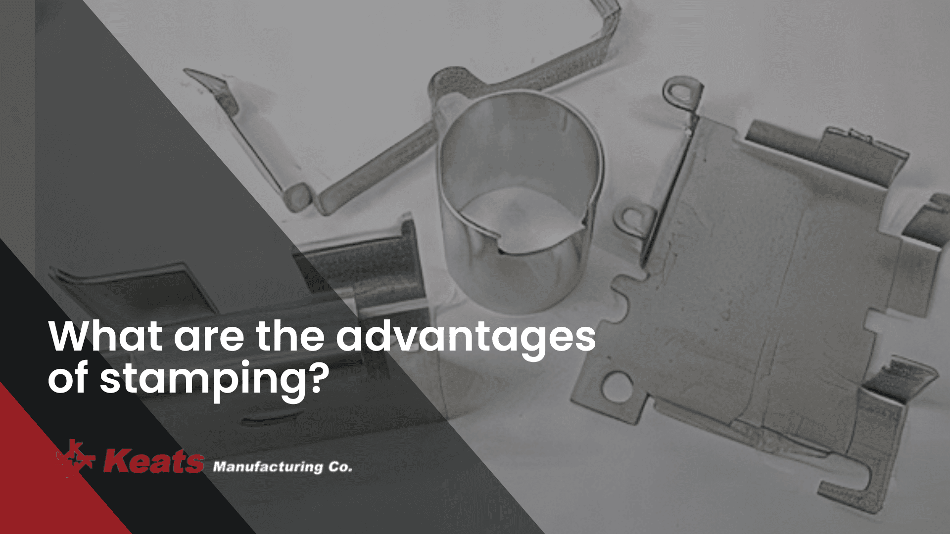 Close-up of metal stamping tools and machinery at Keats Manufacturing.