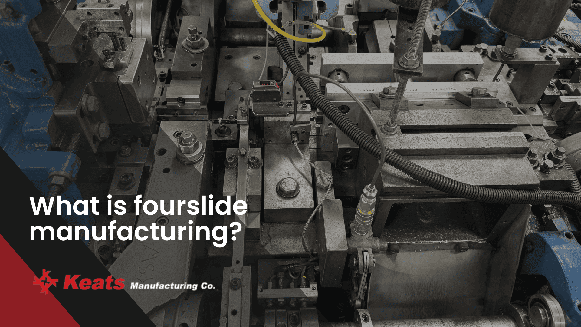 Fourslide manufacturing process at Keats Manufacturing with precision machinery.